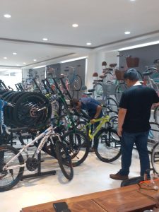 customer in showroom to select bike model